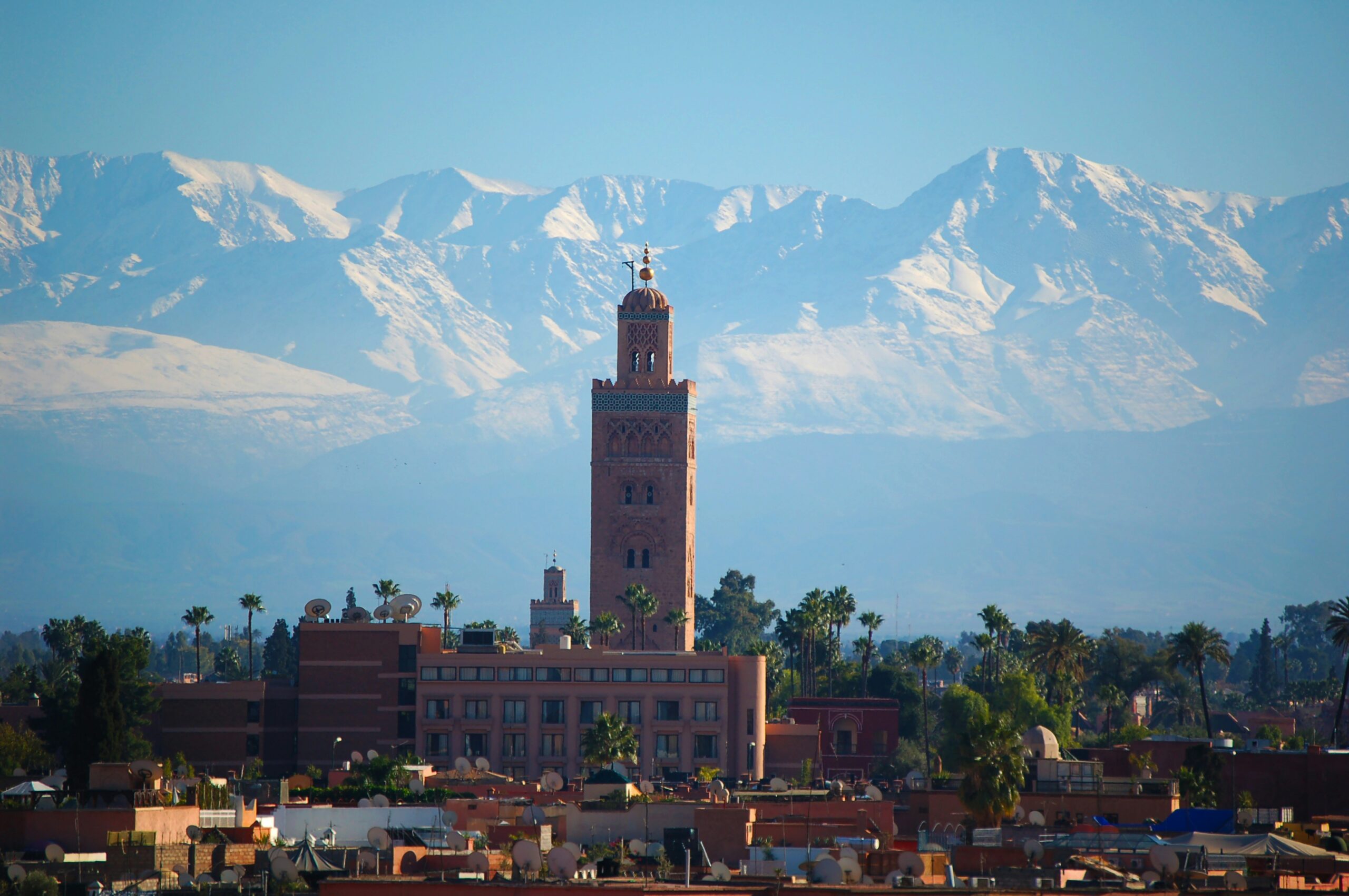 Marrakech skyline with Koutoubia and Atlas Mountains